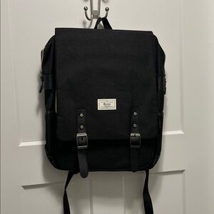 Ronyes vintage laptop backpack, a popular casual daypack for school, work, and t